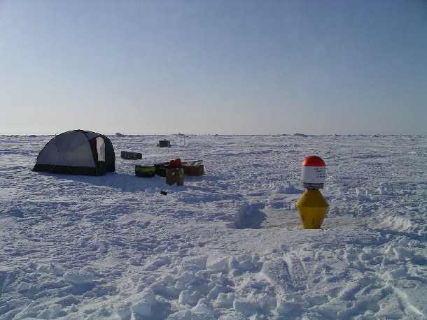 [The deployment tent and installed ocean flux buoy]
